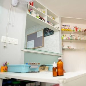 Homoeopathic clinic pharmacy with medicines and remedies neatly arranged